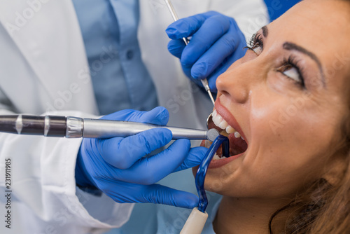 Dentist working on patients teeth