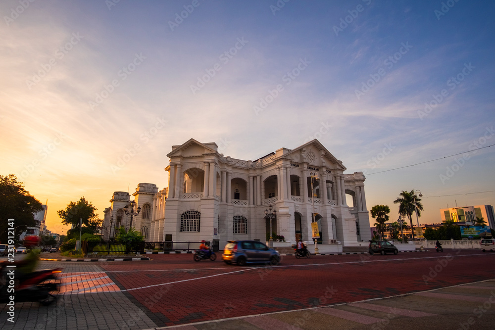 sunrise scenery at Ipoh Town,Malaysia. soft focus,blur due to long exposre. visible noise due to high ISO.