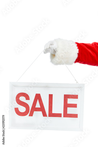 cropped view of santa claus holding discount board with sale sign isolated on white