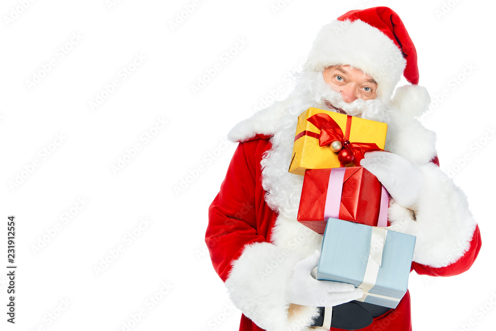 santa claus in red costume with christmas gift boxes isolated on white santa claus in red costume with christmas gift boxes isolated on white