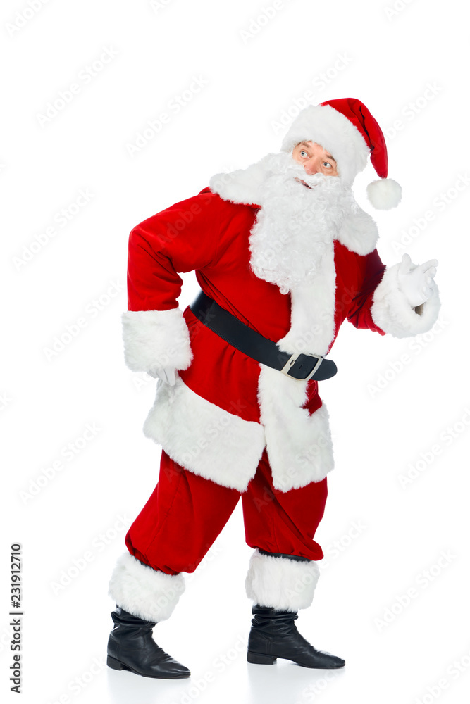 funny santa claus walking in red costume isolated on white funny santa claus walking in red costume isolated on white