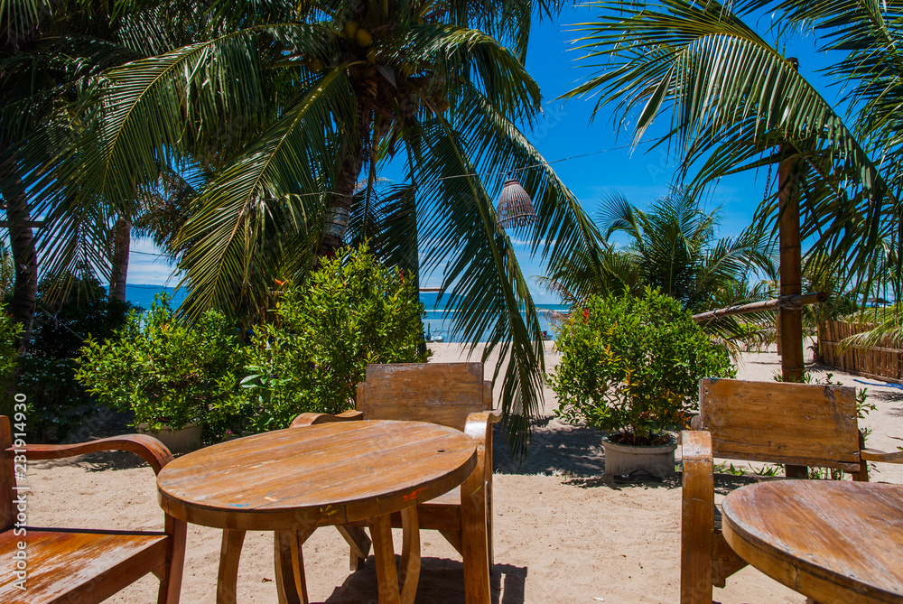 Fototapeta premium Bar table and chair on the beach