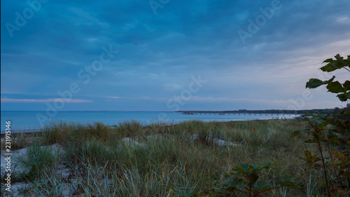 Fototapeta Naklejka Na Ścianę i Meble -  sunset nature scene baltic sea strand an der ostsee bei boltenhagen in germany nach sonnenuntergang