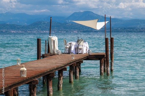 A table for two. Romantic trip to Lake Garda in Italy