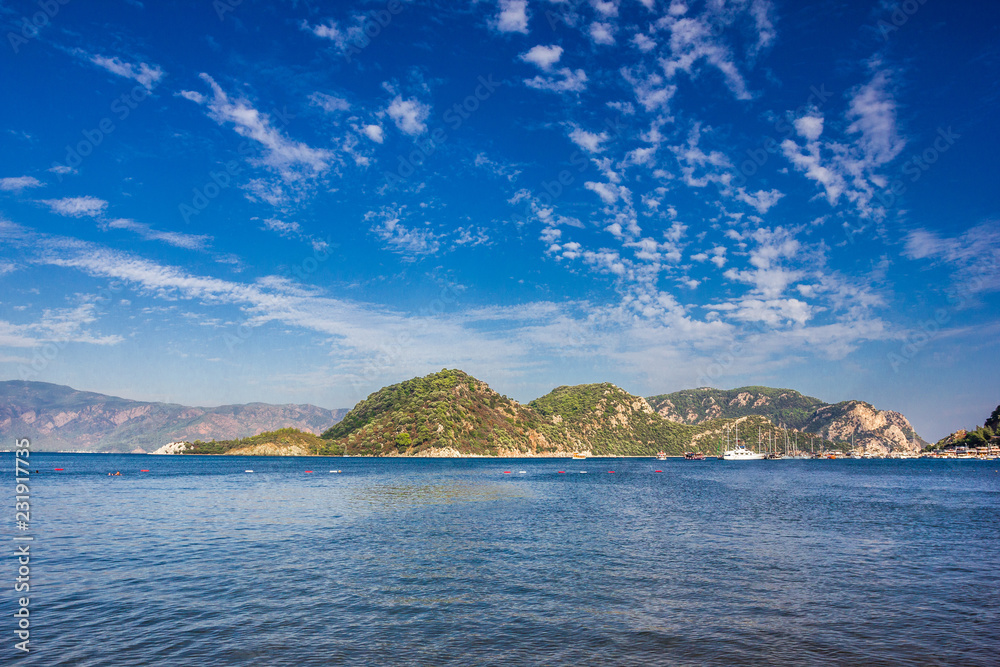 Rocky mountain Islands in the Bay of Marmaris. Seascape with blue sky.