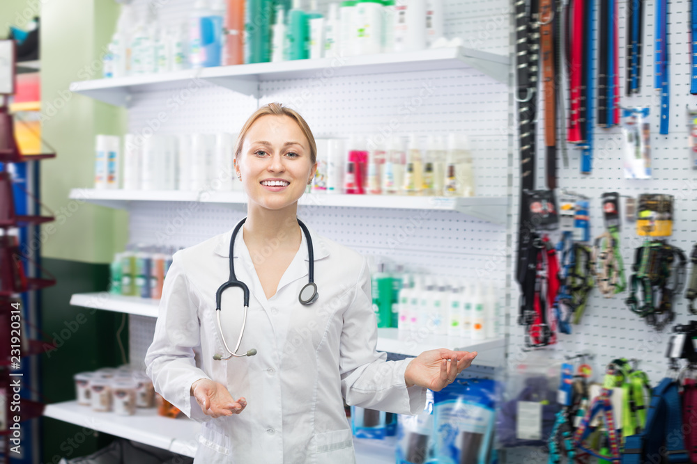 Glad woman vet recommending on goods for pets