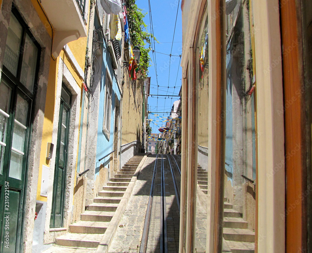 Lisboa/ Narrow streets with tram