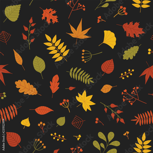 Botanical seamless pattern with autumn tree leaves and sprigs with berries on...