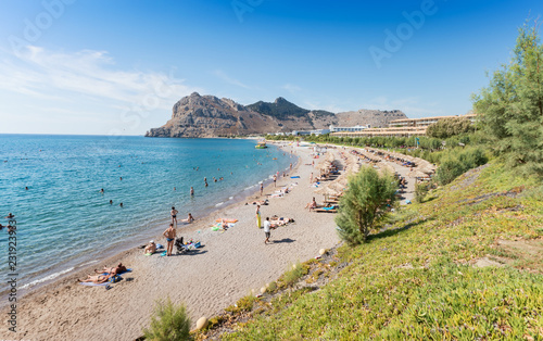 People enjoying their vacation on Kolymbia beach (Rhodes, Greece)