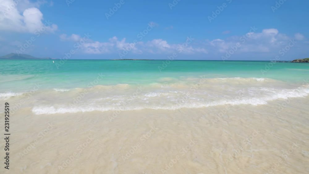 Beach and ocean waves in Hawaii in 4k slow motion 60fps Beach and ocean waves in Hawaii in 4k slow motion 60fps