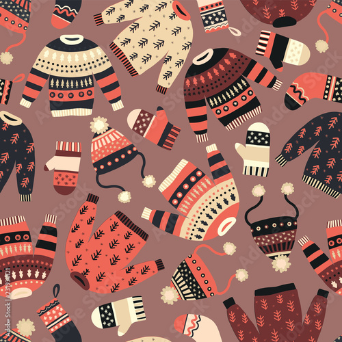 Winter clothes seamless vector pattern. Hand drawn cozy and warm mitten, glove, hat, sweater. Female knitted wool accessories seamless background. Scandinavian Winter wear. Norwegian knit fashion.