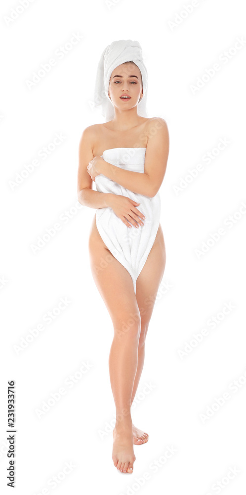 Full length portrait of young pretty woman with towels on white background Full length portrait of young pretty woman with towels on white background