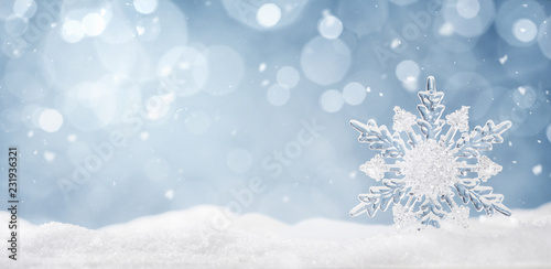 Winter background, ice crystal snowflake in the snow with copy space  © rangizzz