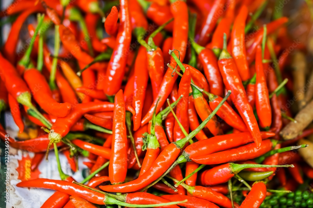 Close-up several red peppers cook or hot peppers is a spicy vegetables, Organic ingredients for cooking of Mexican food. Close-up several red peppers cook or hot peppers is a spicy vegetables, Organic ingredients for cooking of Mexican food.