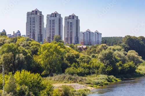 high-rise apartment buildings in the middle of the forest