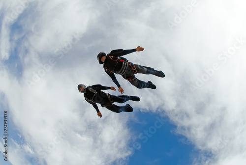 Skydivers diving fast