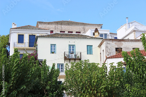 Skopelos town historical architecture buildings houses street view clear sky