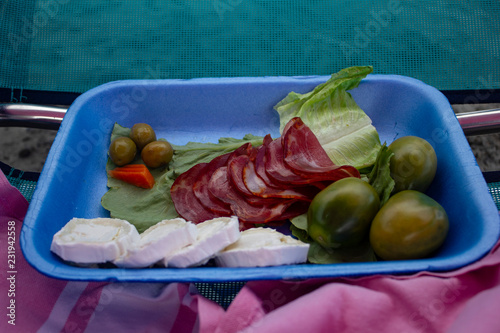 lunch on the beach, ham, cheese, vegetables, tomatoes, olives
