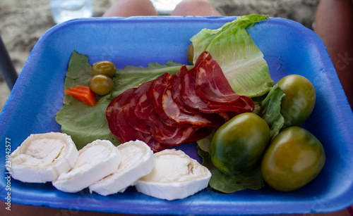 lunch on the beach, ham, cheese, vegetables, tomatoes, olives