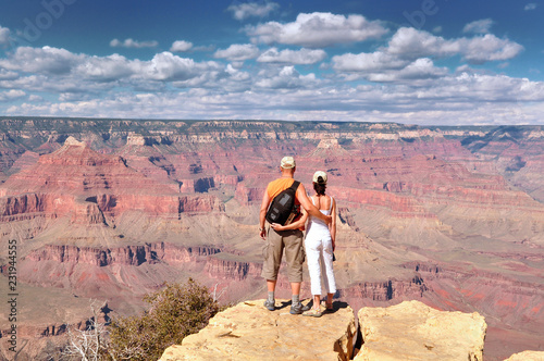 Couple on rim in Grand Canyon USA