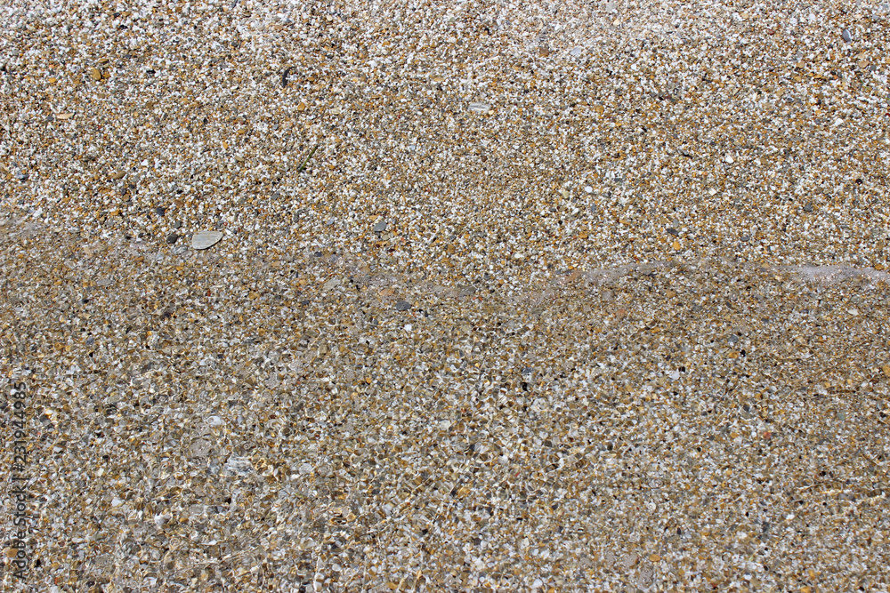 Shallow sea water beach sand pebbles Shallow sea water beach sand pebbles