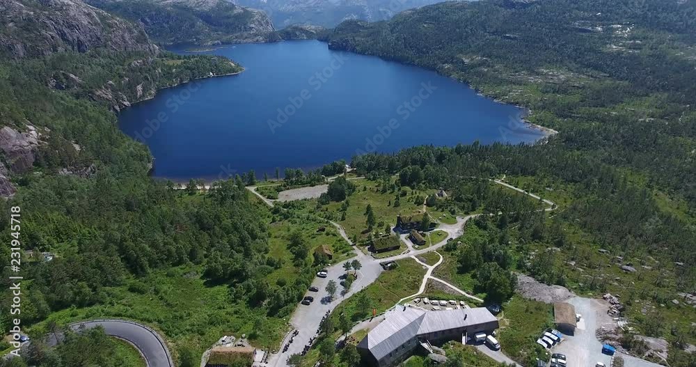 View over Norwegian Revsvatnet glacier lake and Pulpit Rock parking ...