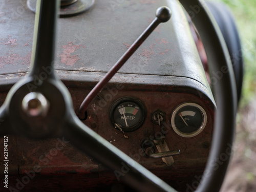 Detail: water & oil guages on old tractor.
