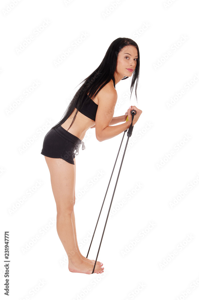 Woman exercising with a robe to get muscles Woman exercising with a robe to get muscles