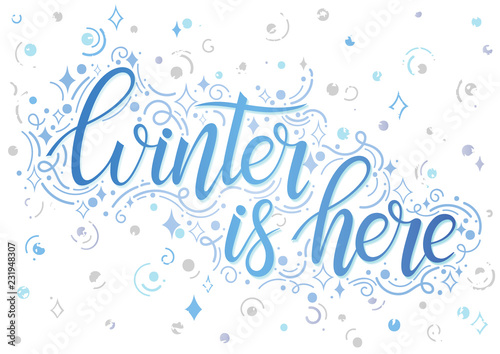 Holidays typography.Winter is here - Hand painted lettering with stylized snowflakes,swirls and sparkles.Seasons greetings card designs perfect for prints, flyers, cards and more.