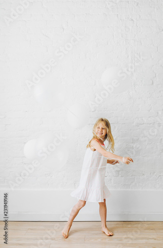 Girl Playing With Balloons