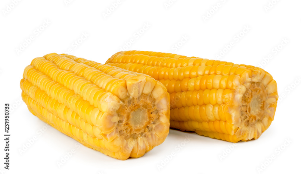 Two boiled corn closeup on a white. Isolated. Two boiled corn closeup on a white. Isolated.
