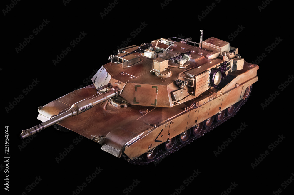 Model of the american battle tank Abrams. Black background Model of the american battle tank Abrams. Black background