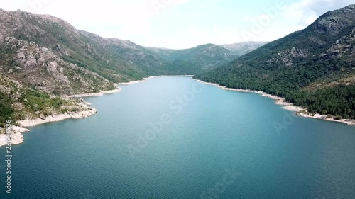 Aerial view of a lake surrounded by mountains landscape photo