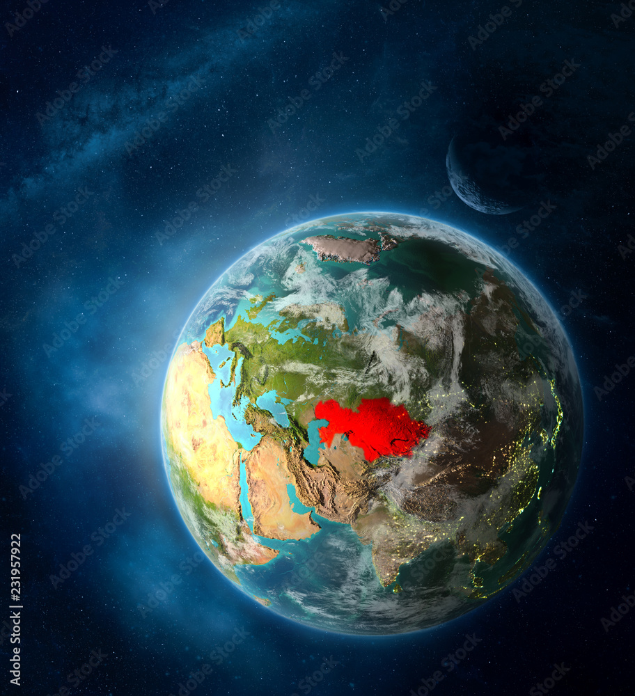 Fototapeta premium Kazakhstan from space on Earth surrounded by space with Moon and Milky Way. Detailed planet surface with city lights and clouds.