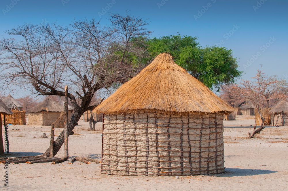 Typical thatched roof African round hut in Botswana. Typical thatched roof African round hut in Botswana.