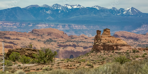 View of rocky terrain and La Sal Mountain in Moab photo