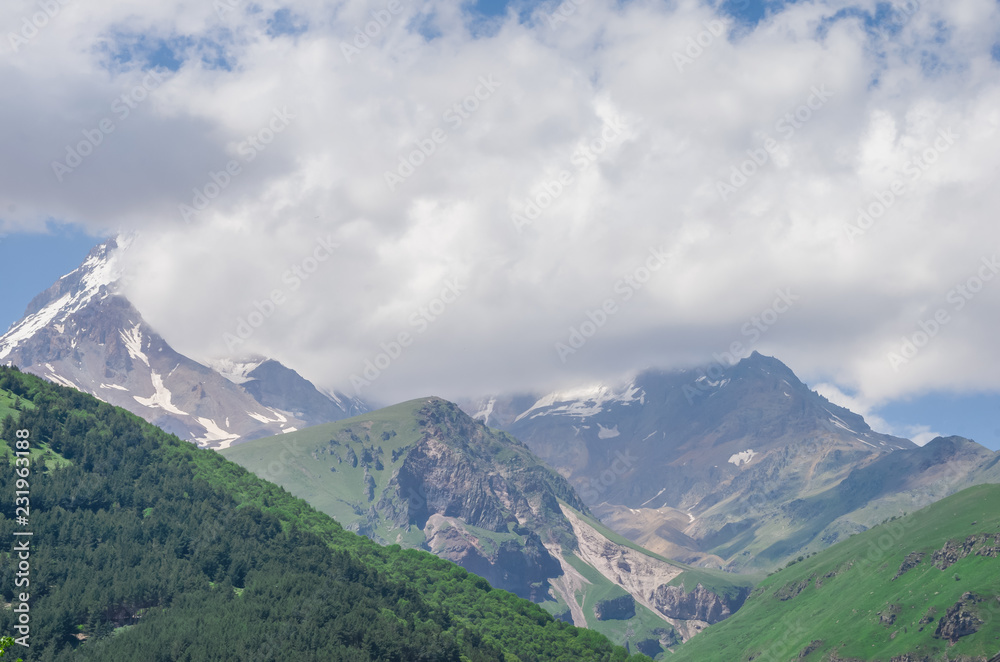 a beautiful landscape of mountains, mountains in clouds a beautiful landscape of mountains, mountains in clouds