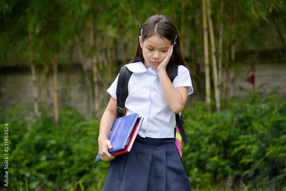 Unhappy Child Girl Student With Books Unhappy Child Girl Student With Books
