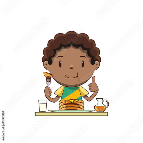 Boy eating pancakes