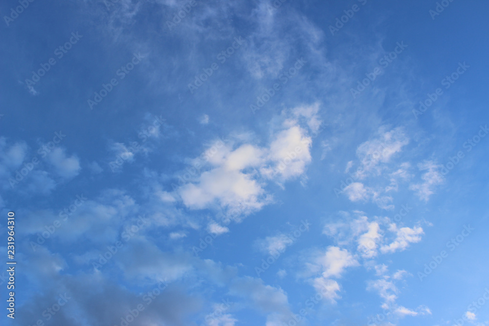 White thin clouds on deep blue sky White thin clouds on deep blue sky