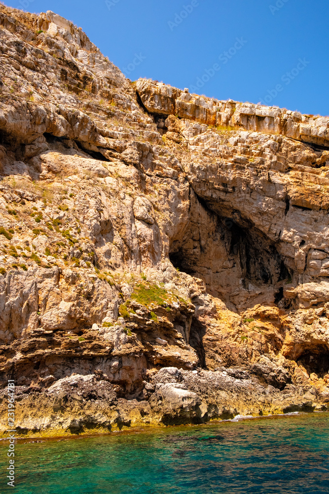 Alghero, Sardinia, Italy - Limestone cliffs of the Capo Caccia cape at the Gulf of Alghero