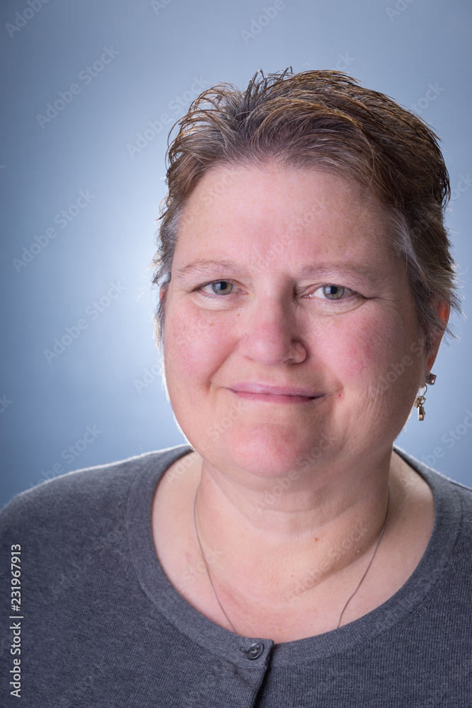 Middle-aged woman smiling Middle-aged woman smiling