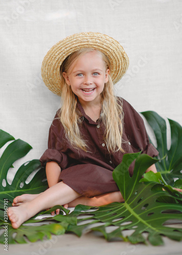 portrait of little girl outdoors in summer