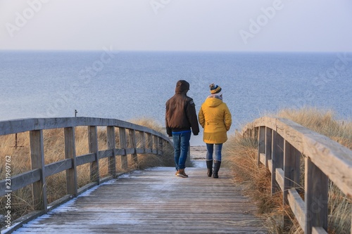 Fototapeta Naklejka Na Ścianę i Meble -  walk by the sea - mother and son