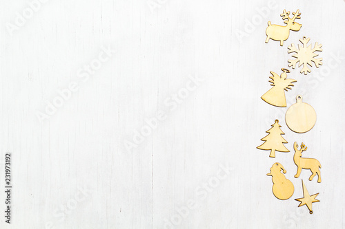 Christmas wooden ornaments on white background.