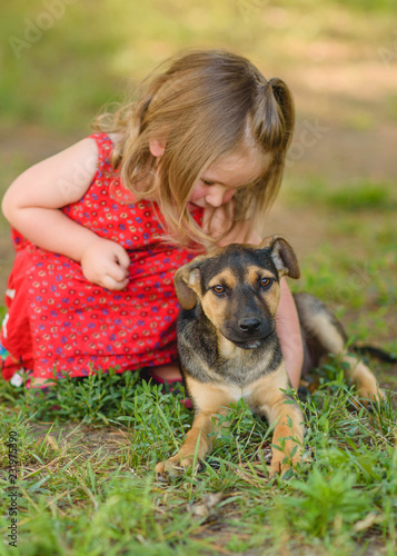 portrait of little girl outdoors in summer © zagorodnaya