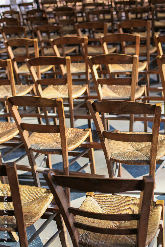 Empty Wooden Chairs in a Church