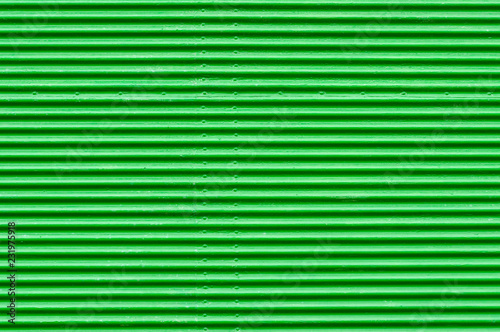 Ein alter grüner Rollladen als ein Hintergrund