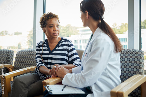 Female patient speaking with doctor