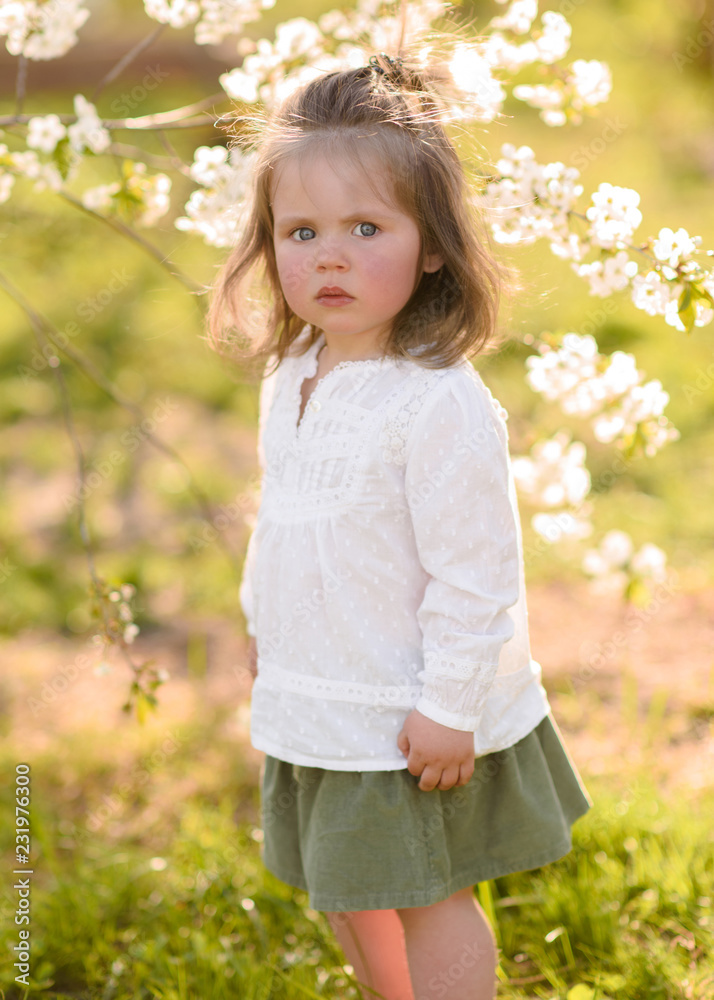 portrait of little girl outdoors in summer portrait of little girl outdoors in summer